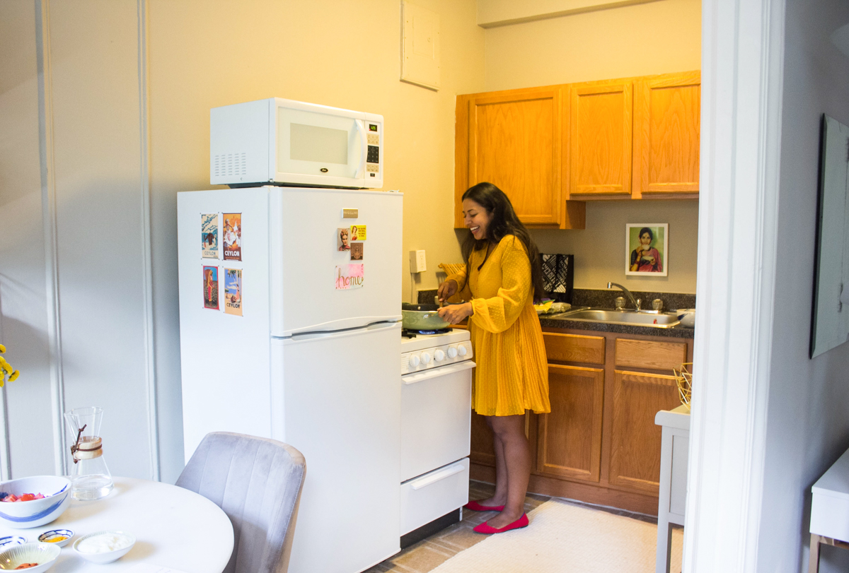 Rafia cooking in her kitchen