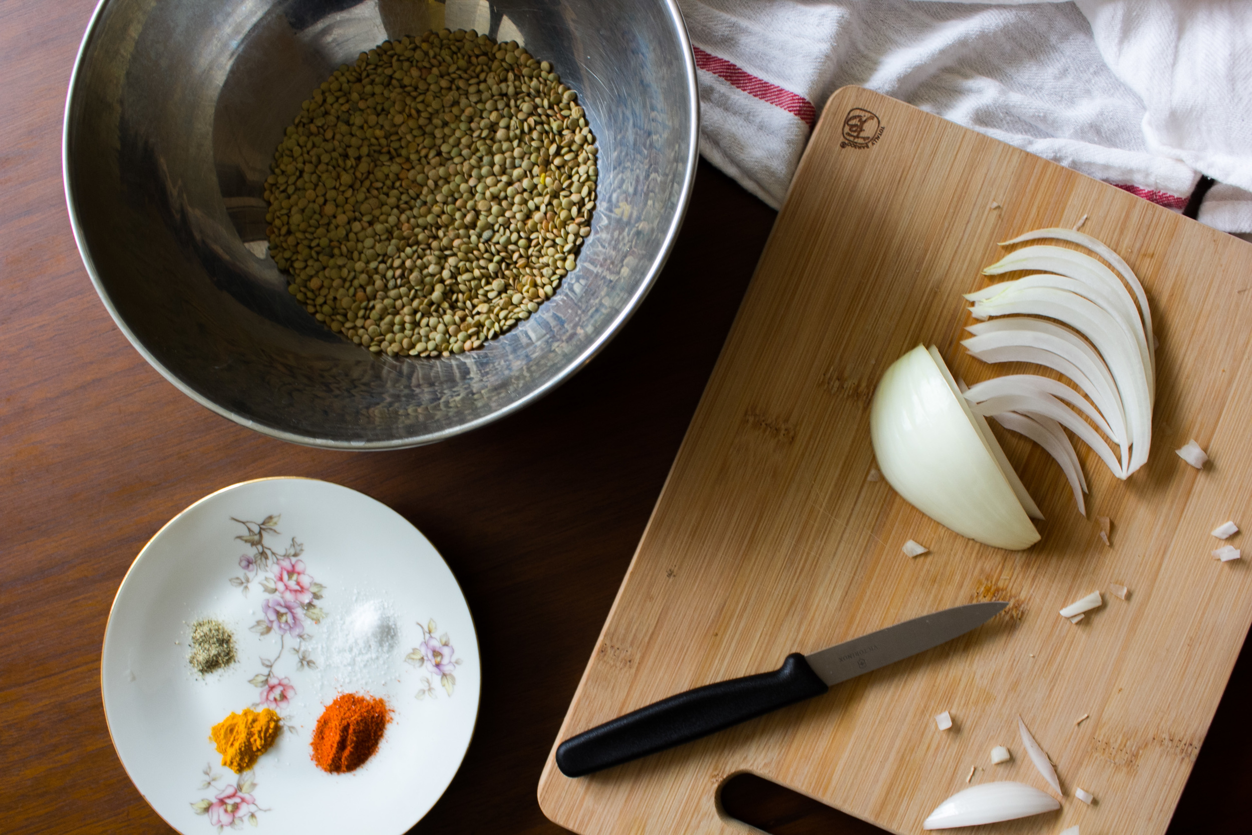 Sliced onion, ground spices and lentils
