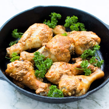 chicken drumsticks in skillet