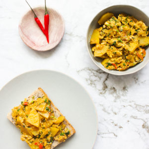 khagina on toast and in a bowl alongside red chilies