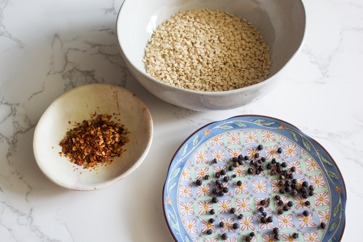 Urad dal, chili flakes and peppercorns 