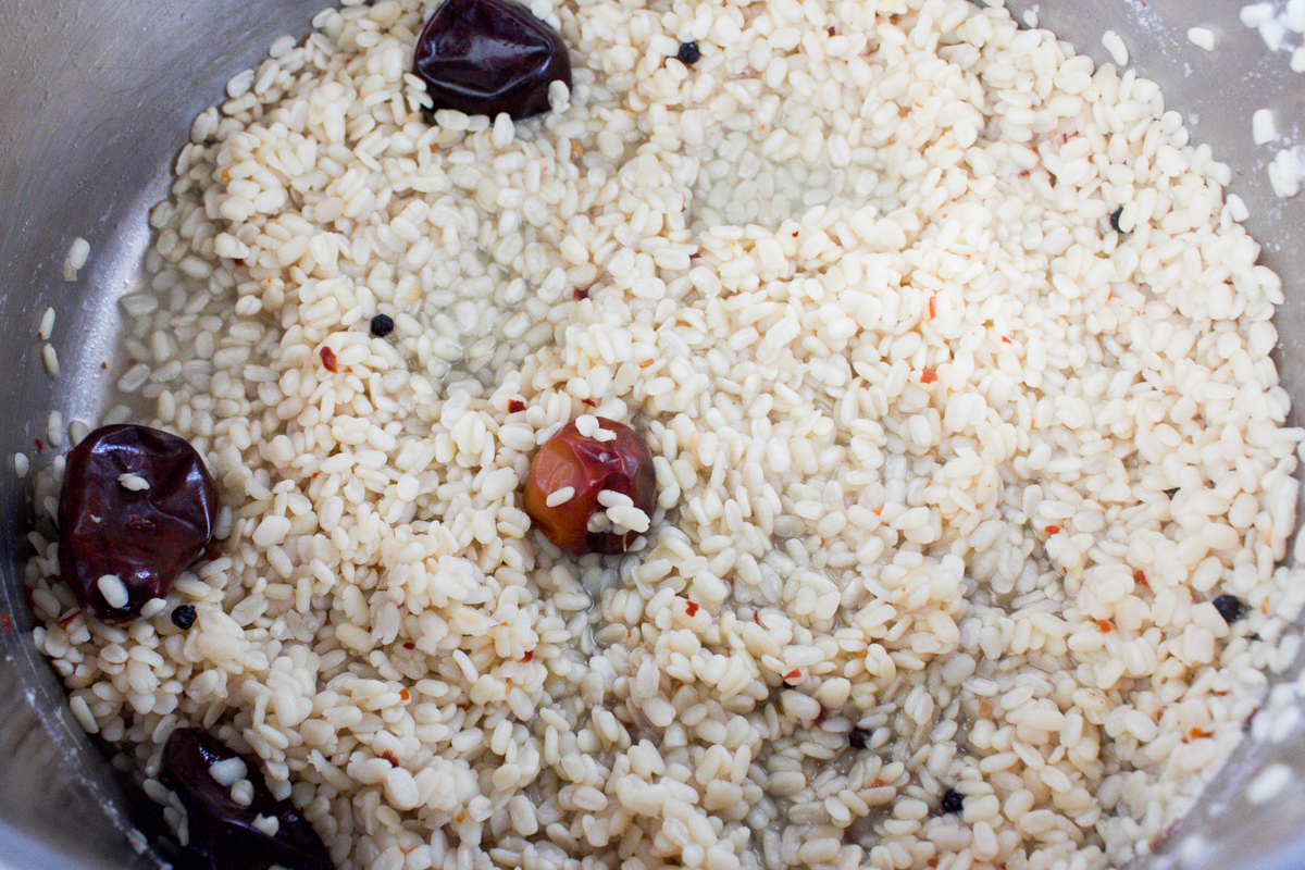 urad dal in pot with water boiled out 