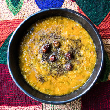 Bowl of masoor moong daal with tadka