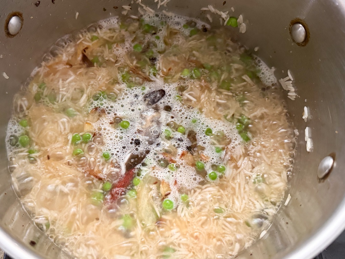 Add water to pulao, and bring to boil. 