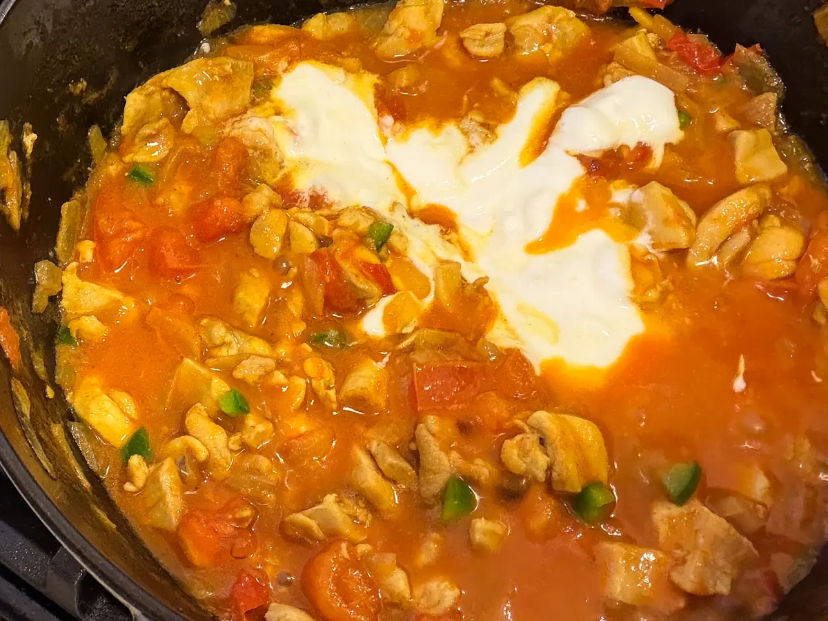 Whisked yogurt added to ginger chicken